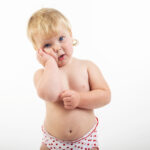 Portrait of a cute little girl, isolated on white